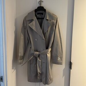 Stylish mid-thigh belted double breasted trench, grey-green with sheen.